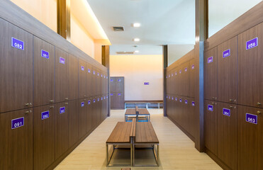 Locker room with wooden  closet and bench clean dressing room interior for club house achitecture...