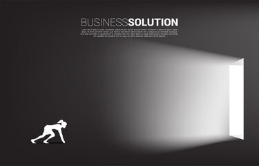 Silhouette of businesswoman ready to exit a door. Concept of career start up and business solution.