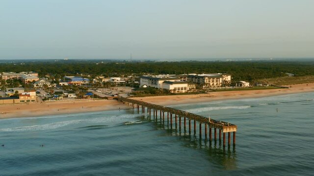 Aerial view of the Saint Augustine Beach Pier at Sunrise on Florida's east coast.
