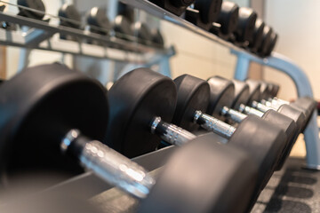 Fototapeta premium dumbbell on a wooden table