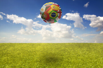 Naklejka premium World flags soccer ball on a playing field