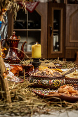 Kutya - wheat porridge with nuts, raisins, honey, poppy seeds. Holy evening, a table with 12 lenten dishes. traditional Christmas sweet meal in Ukraine