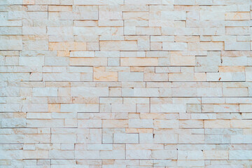 Old grunge white brick abstract background.