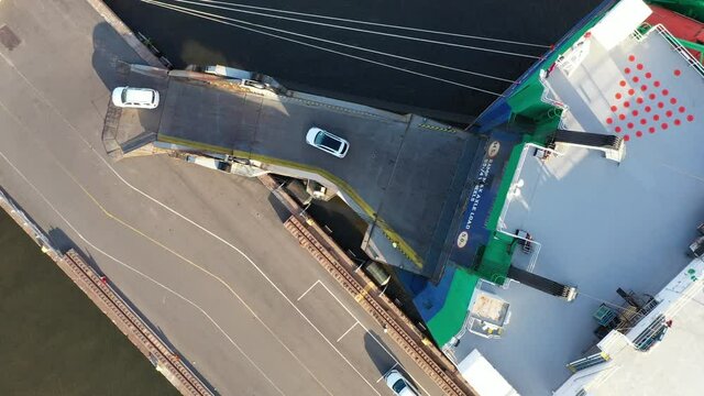 Overhead Aerial View of Vehicles Being Loaded and Unloaded from a Vehicle Carrier Ship Delaware River Philadelphia
