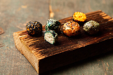 Round balls of cheese chevre in aromatic oil with spices. Chevre goat cheese with herbs and paprika