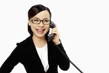 Businesswoman smiling and talking on the phone