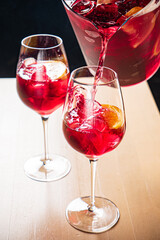 cold sangria with fresh fruits and berries