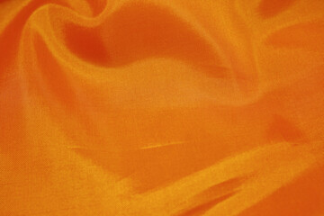 厚手のジャンパーのポリエステルのすべすべした橙色の裏地