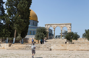Dome of the Rock and gate leading to the dome on the territory of the interior of the Temple Mount in the Old City in Jerusalem, Israel