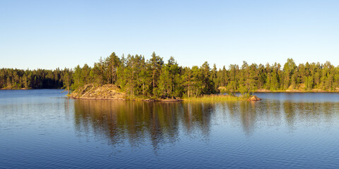 island on a forest lake