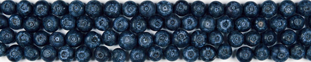 nature and healthy food concept - Top view of fresh blueberries isolated on white background. Copy space.
