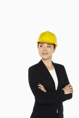 Female architect standing with arms crossed