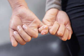 Men and women shake hands to show love and compassion to live together. Good relationship concepts