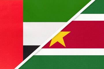 United Arab Emirates and Suriname, symbol of national flags from textile. Championship between two countries.