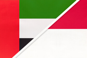 United Arab Emirates or UAE and Monaco, symbol of national flags from textile. Championship between two countries.