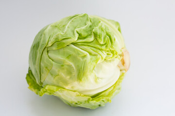 Fototapeta premium young cabbage on a white background