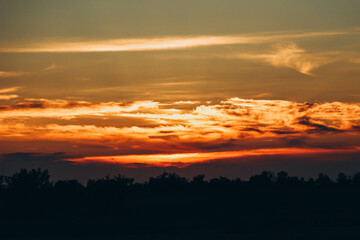 Obraz premium sunset over the mountains and sea