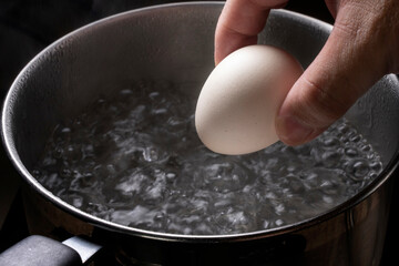 Put The Egg To Boiling Water