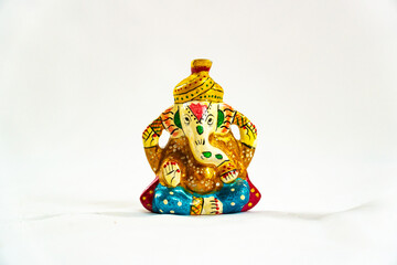 Sacred, colourful, meditating elephant god.