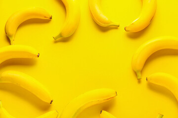 Ripe bananas on color background © Pixel-Shot