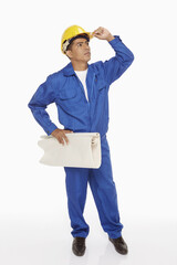 Construction worker looking around