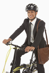 Businessman riding a bicycle