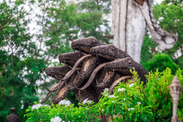 Sala Keoku-Nongkhai:June19,2020,the atmosphere inside the religious tourist site,there is a garden and a corridor around a large sculpture,tourists come to see the beauty of the holiday,Thailand