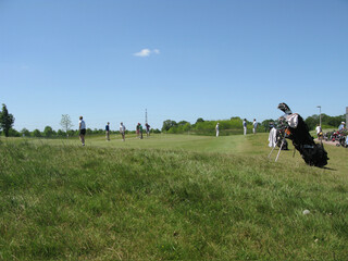 Fototapeta premium Golfers on putting green