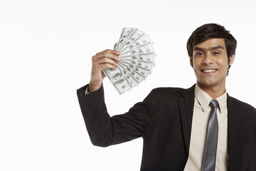 Businessman holding money