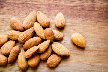 Almonds on a wooden cutting board