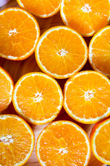 Bunch of fresh sliced oranges on a tray