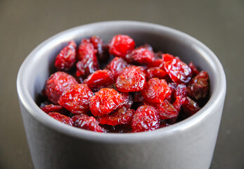 Cranberries in a bowl on a kitchen table