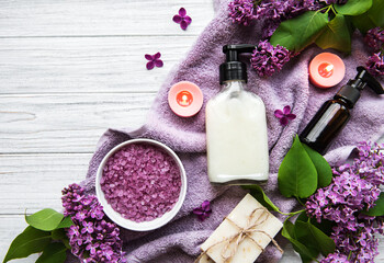 Spa setting with lilac flowers