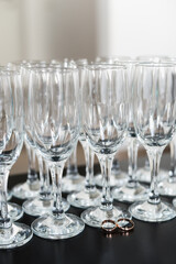 champagne glasses, wedding rings