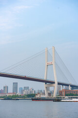 Fototapeta na wymiar Nanpu Bridge, one of the biggest bridge over Huangpu River, in Shanghai, China.