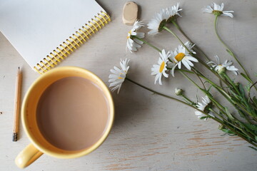 cup of coffee and flowers