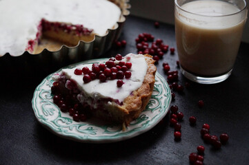 cup of coffee and cowberry cake