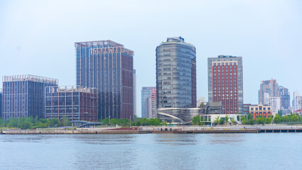 Fototapeta na wymiar The modern buildings along the Huangpu River in Shanghai , China