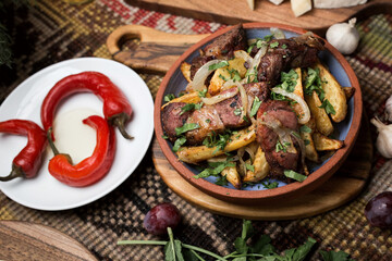 meat stew and chili on the table. regional Georgian food, close-up, top view