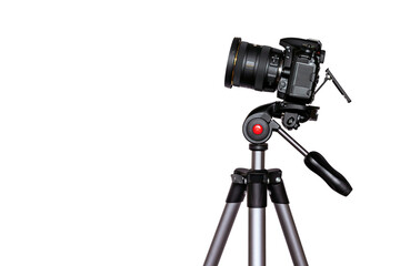 Digital camera on tripod isolated on white background with copy space