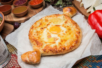 Adjarian khachapuri close up. Georgian cuisine