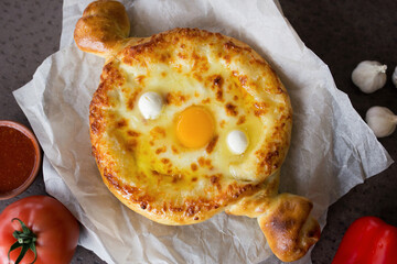 Adjarian khachapuri close up. Georgian cuisine