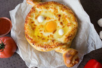 Adjarian khachapuri close up. Georgian cuisine