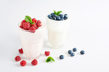 Yogurt cocktail and parfait. Natural detox. Liquid ice cream. Healthy food and breakfast. Good morning. Berry Milk Smoothie with blueberries, strawberries, raspberries. Fresh diet dessert. Summer card