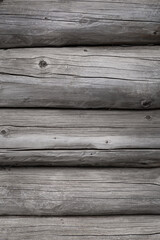 Fototapeta premium Wood texture. Old grey logs with knots. 