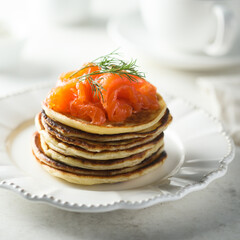 Smoked salmon pancakes with fresh dill