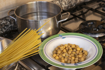  preparing pasta and chickpeas