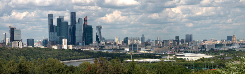 Fototapeta na wymiar Moscow, Russia, panoramic view on city on against cloudy sky.