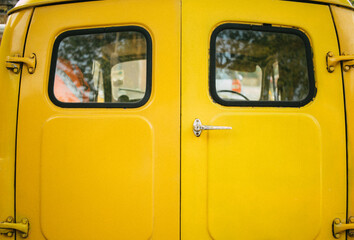 back of a yellow van 