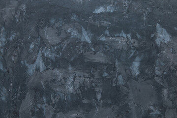 Dark concrete background, wall with texture, preparation for design. Copy space.
